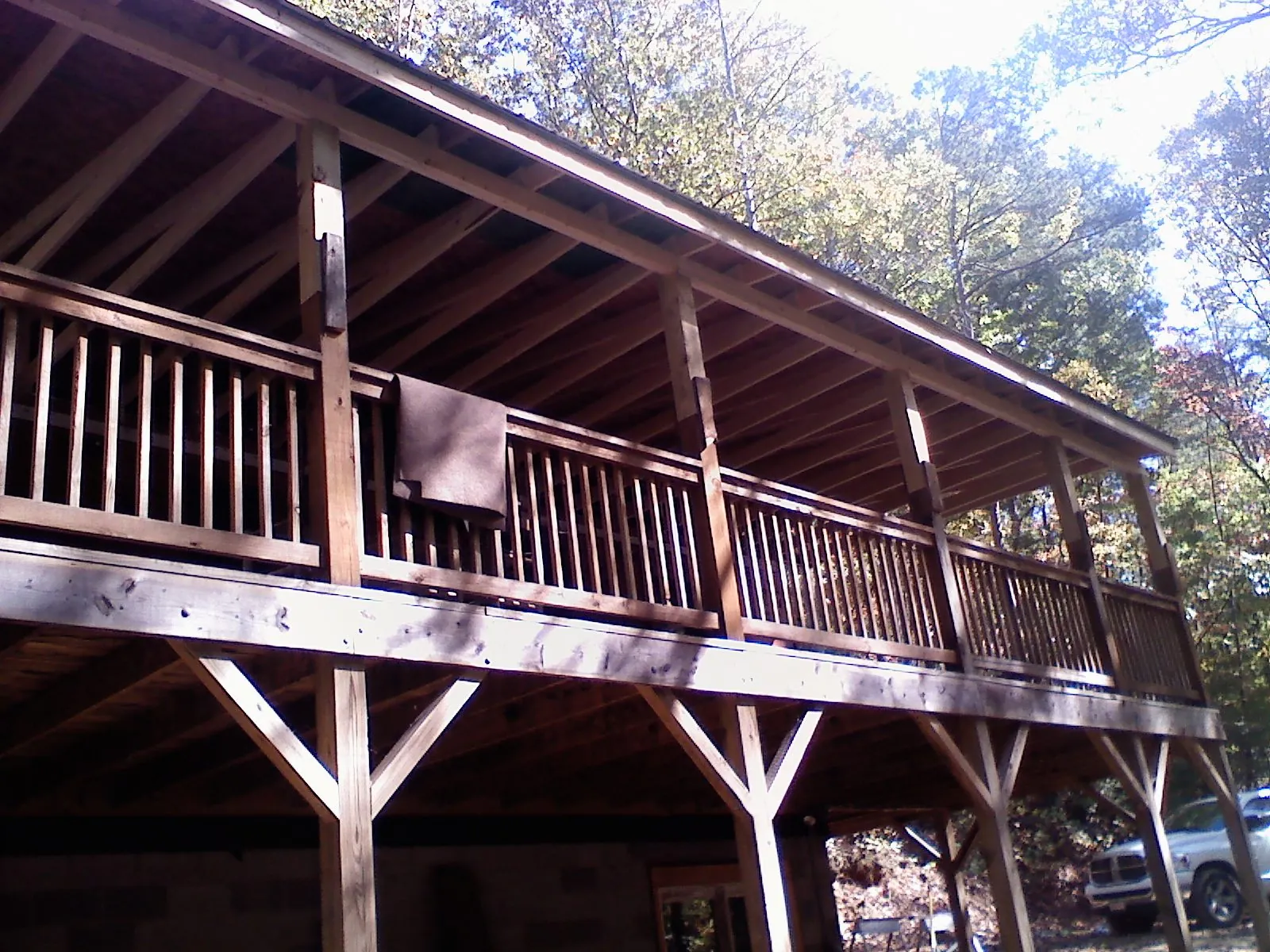Timber framing under a new elevated porch and deck — Roof Leak Repair in Sterling by Roofing Brothers